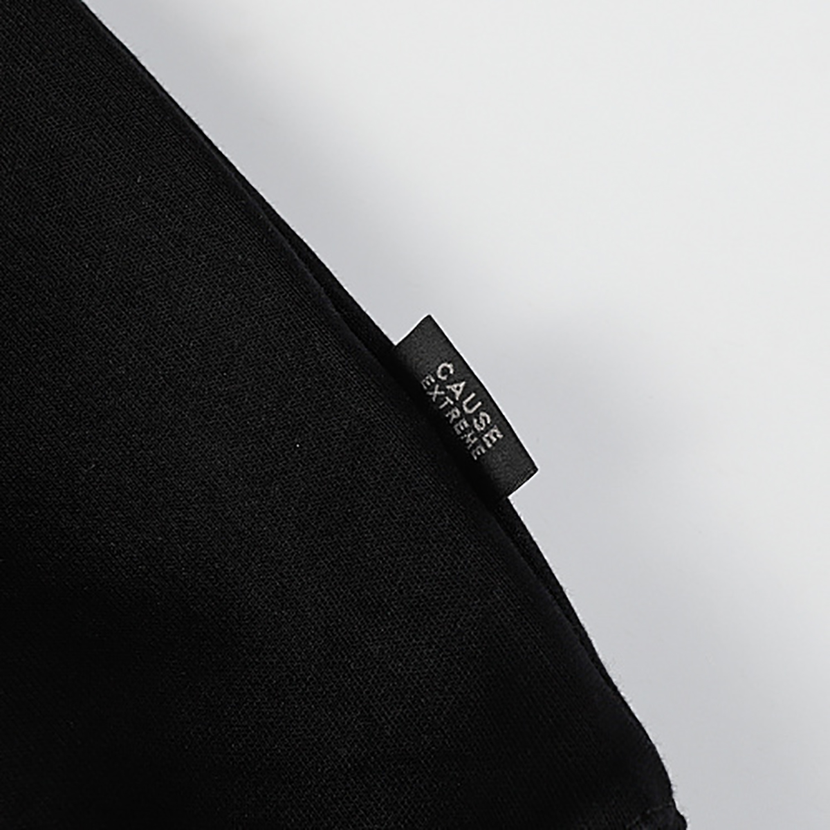 black-hoodie-brand-tag-detail