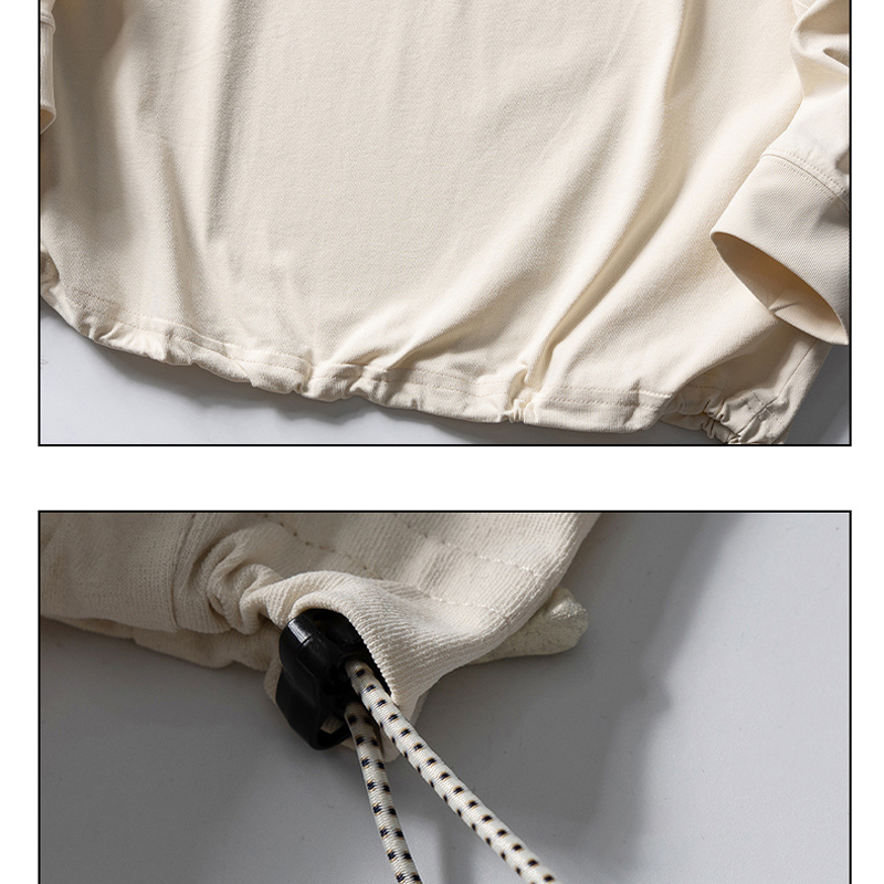 Beige sweatshirt drawstring hem detail