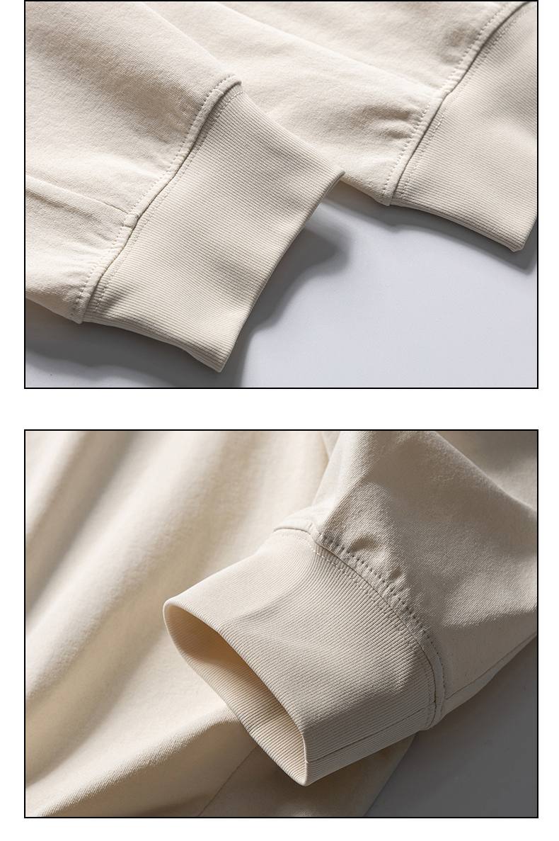 Beige sweatshirt cuff stitching detail