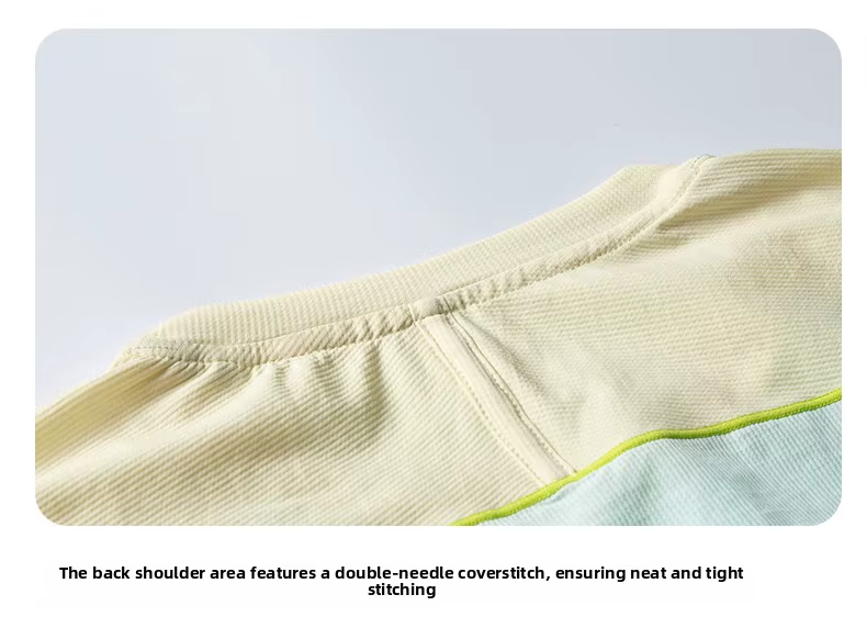 Close-up of raglan t-shirt sleeve stitching detail