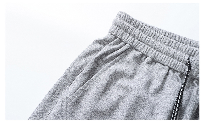 Side Pocket Detail of Couple Tracksuit Sweatpants