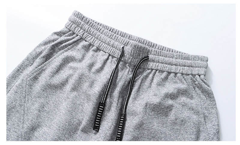 Elastic Drawstring Waist Detail of Couple Tracksuit Pants