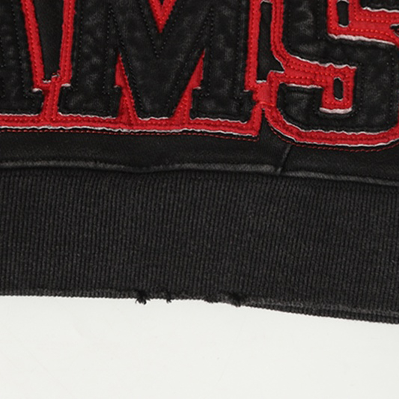 Red Border Embroidery Letter Fabric Close-up